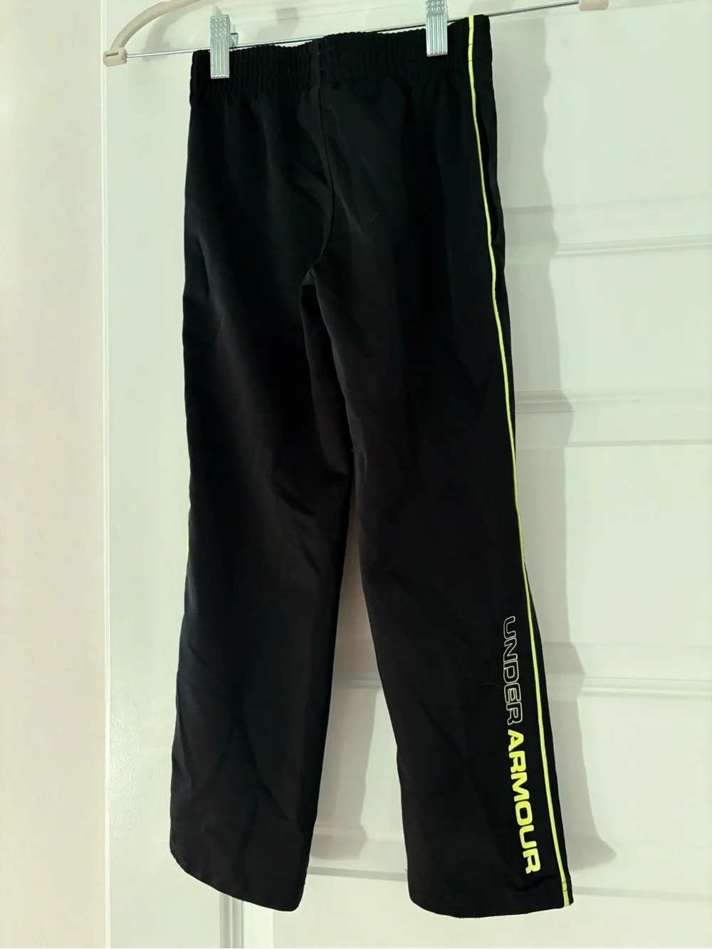 Under Armour Kids Black Joggers with Neon Yellow Trim, size 6